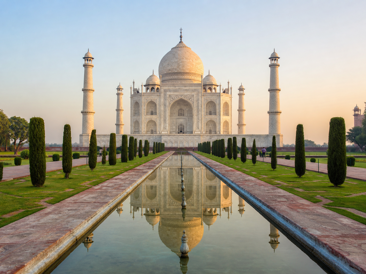 Taj Mahal and its reflecting pool at sunrise